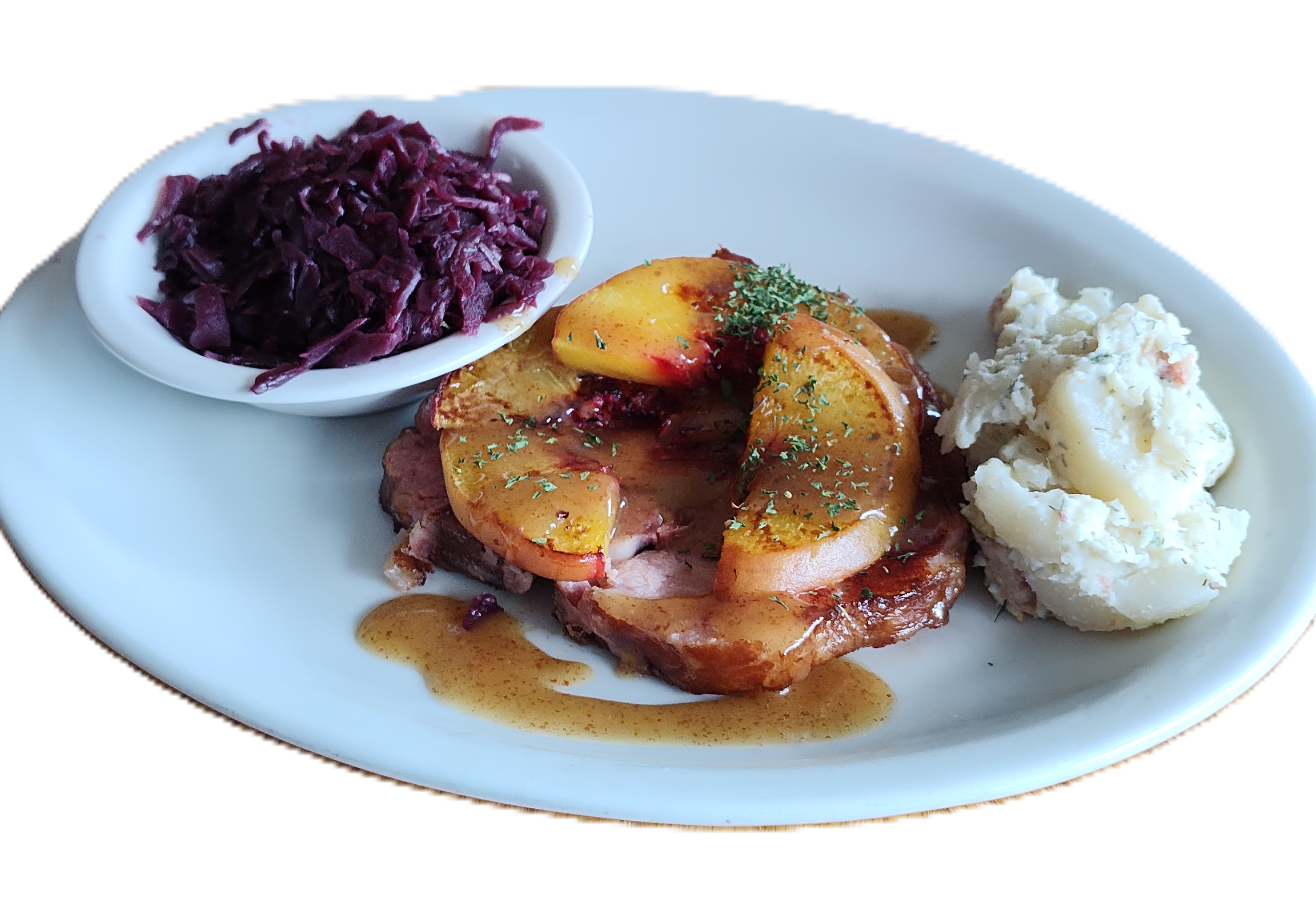 Smoked pork chop with bourbon glazed peaches